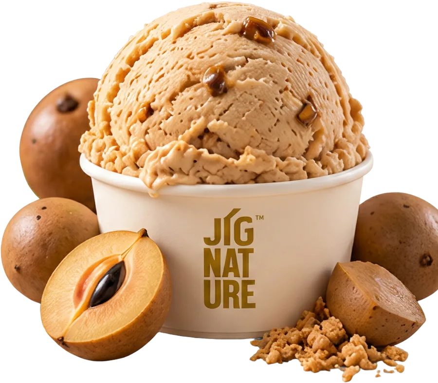 Tub of Jig'Scoop Chikku ice cream with fresh chikku fruits around it