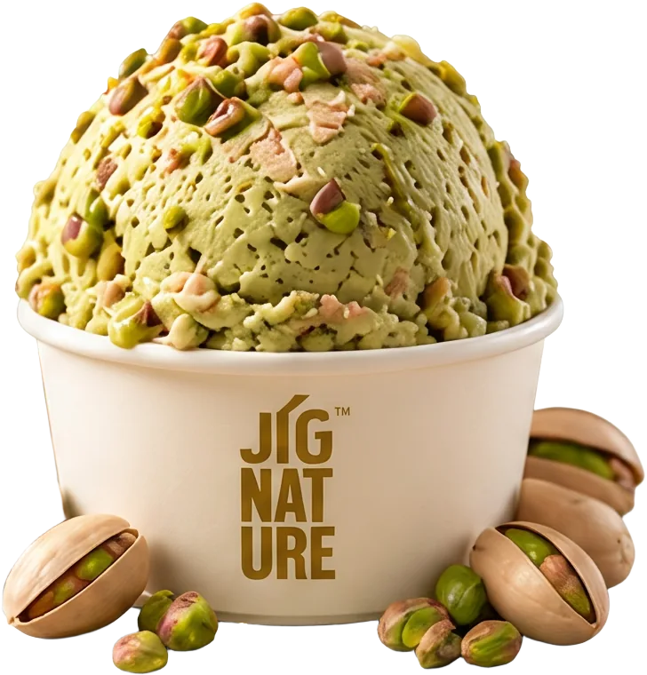 Tub of Jig'Scoop Pista ice cream topped with chopped pistachios